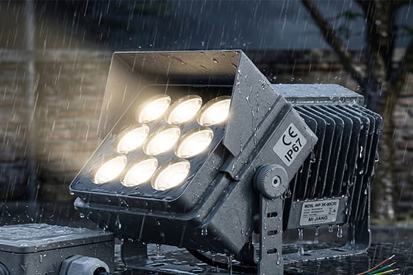 A durable, weatherproof LED flood light in the rain
